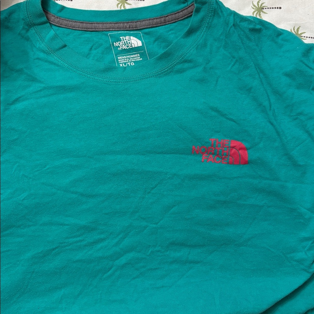 The North Face Turquoise Tee with Pink Logo